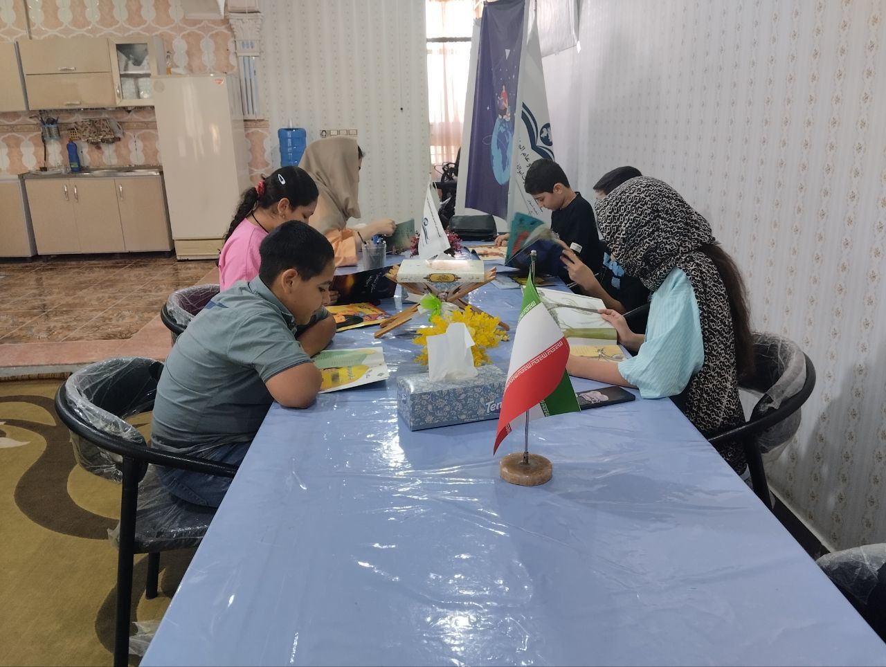 IMG 20250924 104512 528 برگزاری اولین جلسه کارگاه کتابخوانی باغ بیدار در دارالاکرام شوش