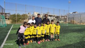 photo1770619002 حضور دانش‌آموزان دارالاکرام بوشهر در فستیوال فوتبال پسران رده سنی ۷–۱۲ سال استان بوشهر